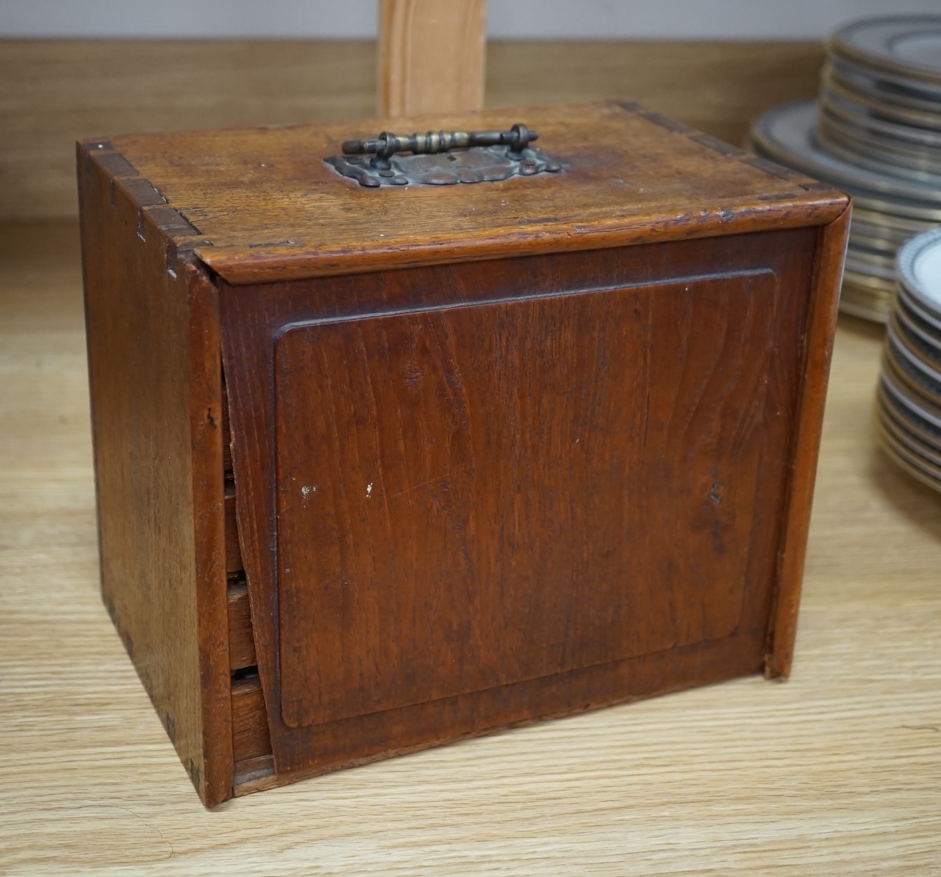 A Chinese boxed bone Mah jong set with five drawers, 19cm high. Condition - poor to fair, case damaged